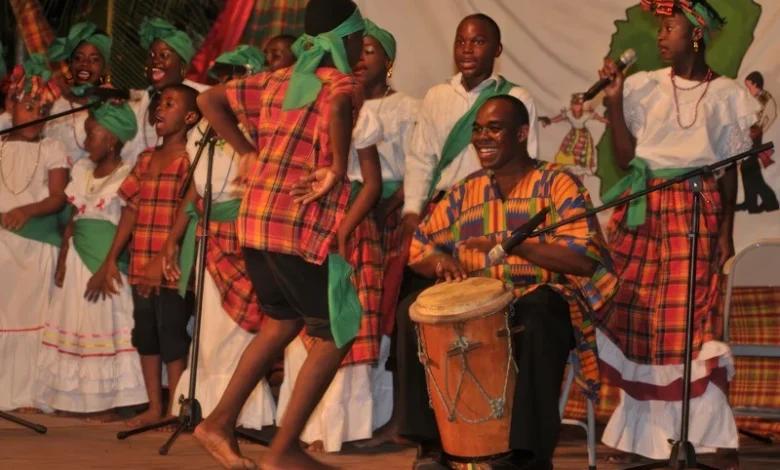 Hands on a lapo kabwit drum at night