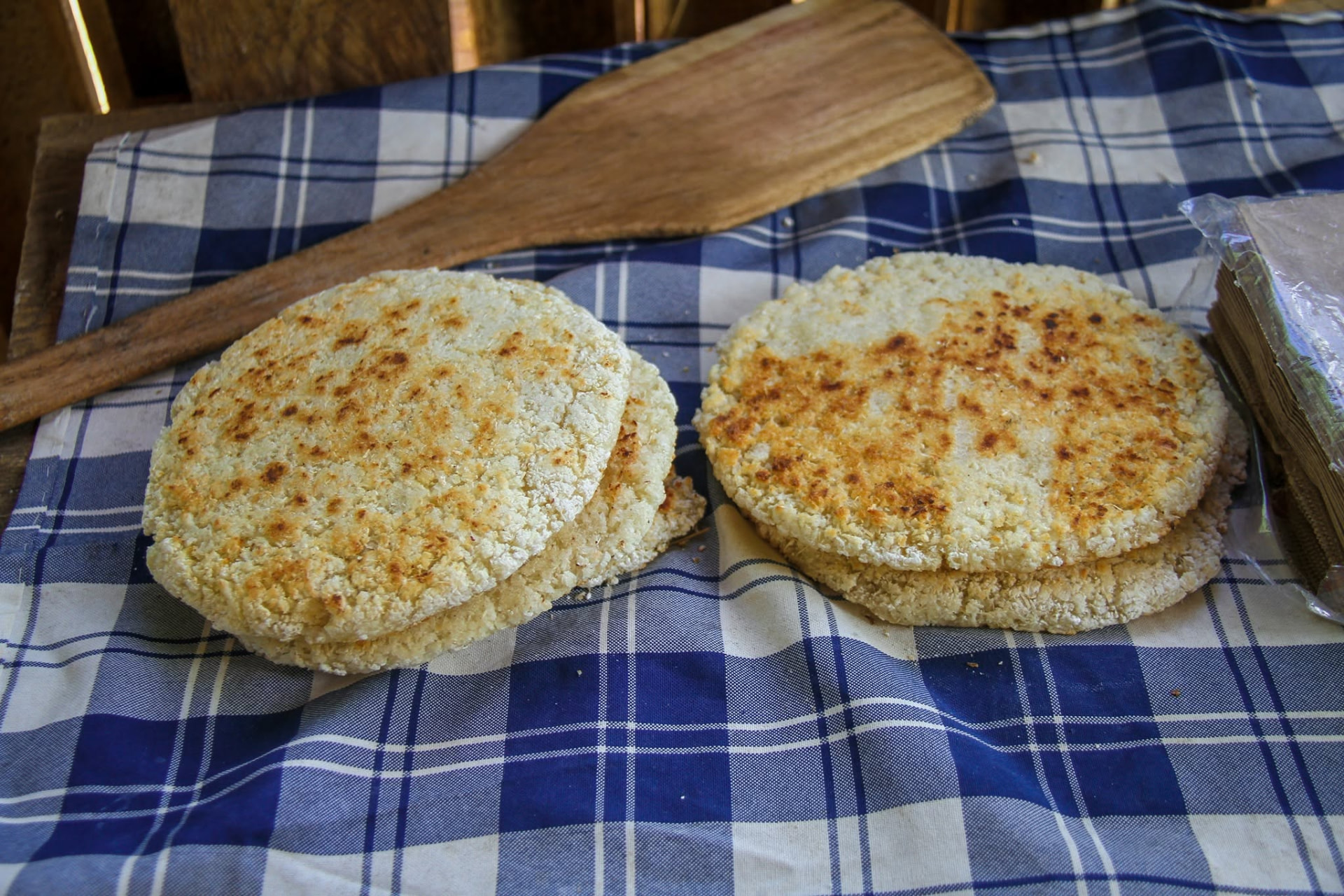 Traditional Kalinago cassava bread on a checkered cloth